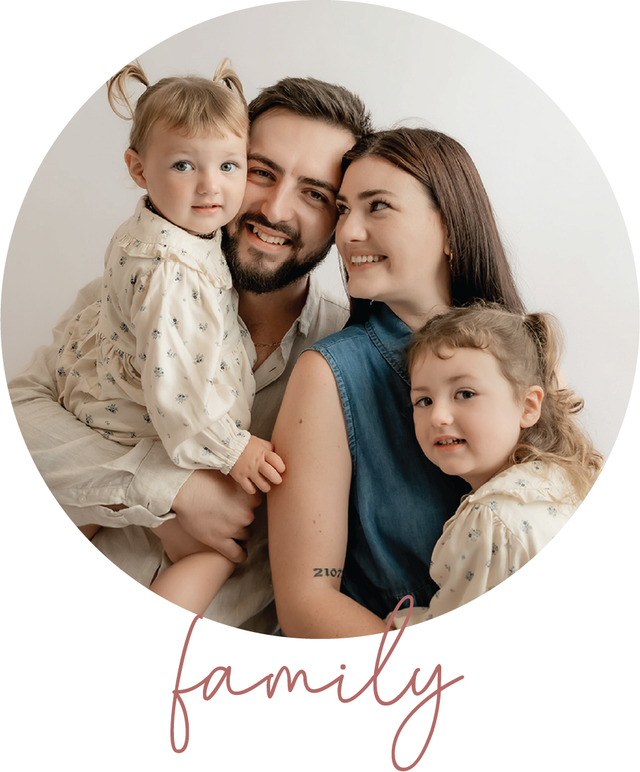 close up portrait of a family of four hugging